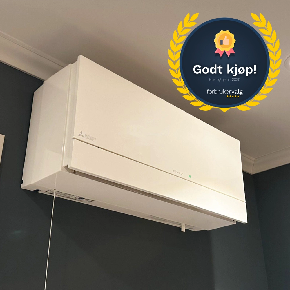 hvit miniventilasjon på blå vegg mot tak godt kjøp forbrukervalg.no logo